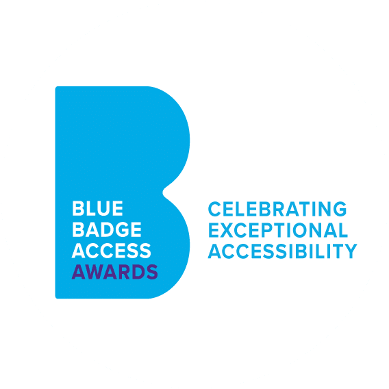 A circular logo featuring a bold, stylised blue letter “B” on the left. Inside the shape of the “B” are the words “Blue Badge Access Awards” in white and purple text. To the right, in blue capital letters, the tagline reads “Celebrating Exceptional Accessibility.” The overall design uses shades of blue and white, conveying a clean and professional identity.